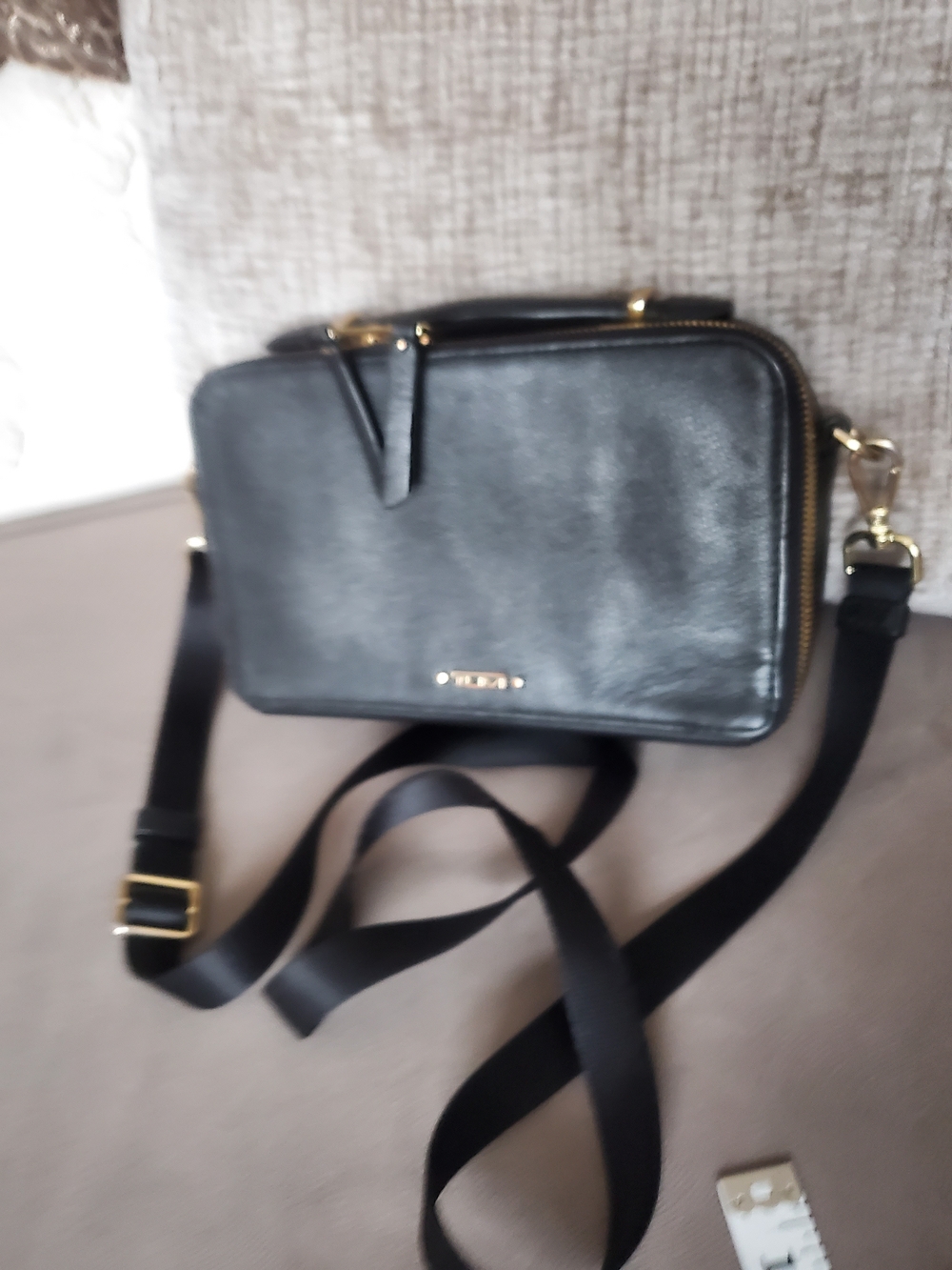 Tumi Voyager Black Leather Crossbody with Gold Accents Bag Womens